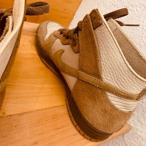 Worn Nike dunk high shoes.